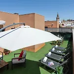 Genteel Zaragoza * Sevilha